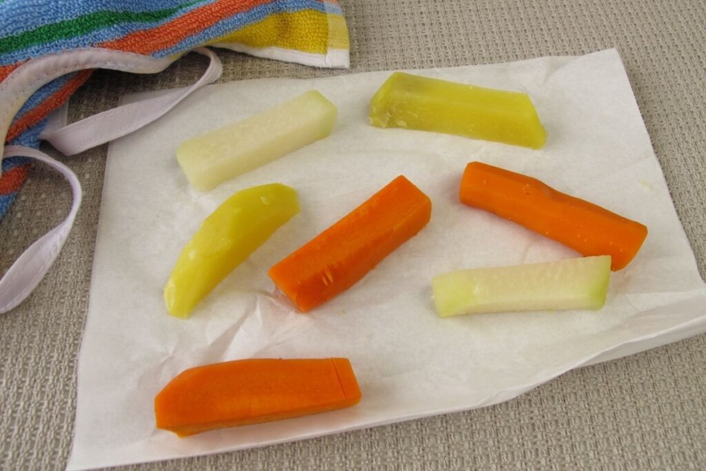 Steamed carrot and parsnip finger food for baby